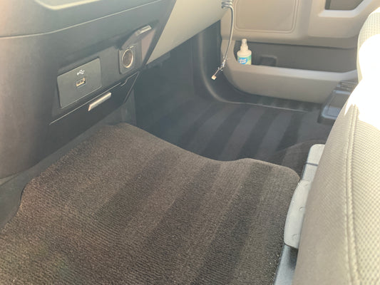 Close-up shot of carpet line art, showcasing the clean and refreshed results after our shampoo and extraction service.