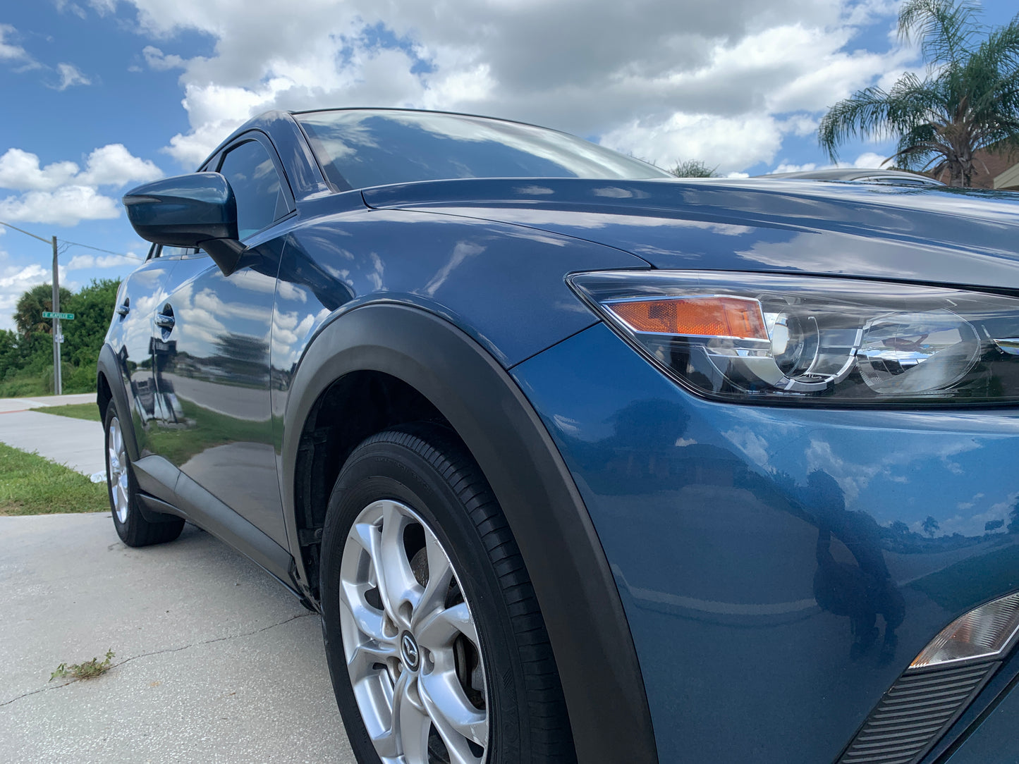 Mazda CX-3 after detailing services, looking shiny and well-maintained with a glossy finish.