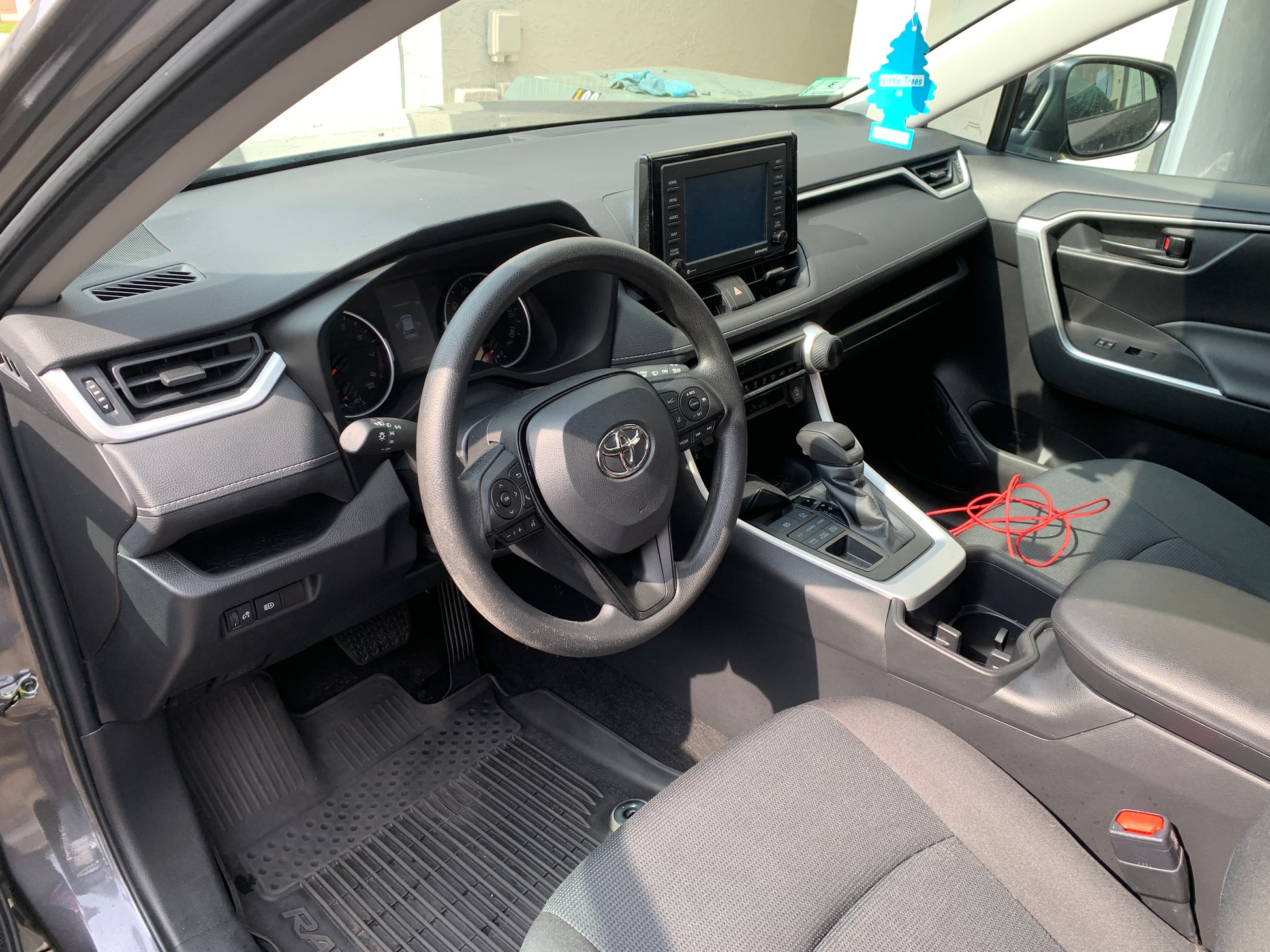  Interior view of the SUV we detailed, showcasing the clean and rejuvenated dashboard, seats, and overall pristine condition after our detailing service.