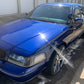 Regular maintenance for a blue Ford Interceptor, visiting every two weeks to maintain the ceramic coating and preserve its shine.