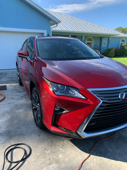 Red Lexus RX 350 after our two-stage paint correction and graphene ceramic coating, showcasing a glossy and smooth finish.