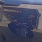 Reflection of the technician in the flawless, high-gloss finish of a limited edition Mercedes after paint correction, showcasing the remarkable results of the service.